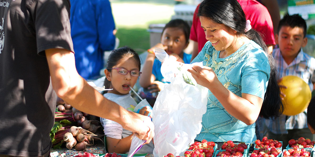 FFRI_BonusBucks_main Photo of customers at the Farmers Market