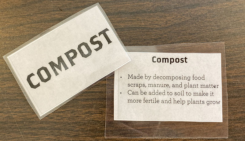 Close up of Compost Card Front and Back from Activity 